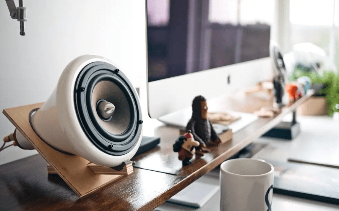 office desk with speaker lo-fi music productivity